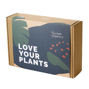Cardboard box with 'Munash Organics' branding and 'Love Your Plants' text on a white background