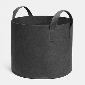 Black fabric pot with handles on a white background