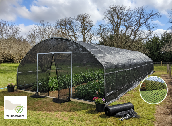 Greenhouse with mesh cover in a garden setting, featuringVIC Compliance logo.
